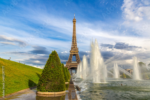 Eiffel Tower and fountains of Trocadero in Paris at sunset, France