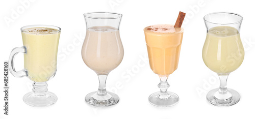 Delicious eggnog in glasses isolated on white, set