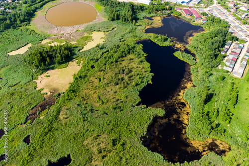 Aerial view of a peat bog. Factory swamps on the outskirts of the city of Borovsk, Russia