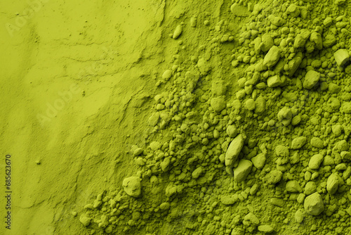  Matcha powder close-up. Green matcha background. Space for text.