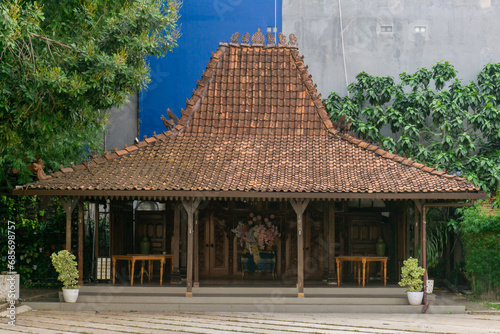 Omah Limasan or Traditional javanese joglo house or rumah joglo roof with ornament. Joglo which consists of 4 main pillars. 