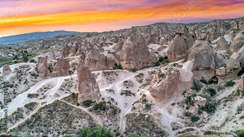 Panoramic view of fairy chimneys in Goreme Historical National Park. Goreme National Park and Rock Sites of Cappadocia, Central Anatolia, Nevsehir Province, Turkey. drone view. Ariel from above, top