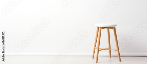 White wooden stool isolated on a white background