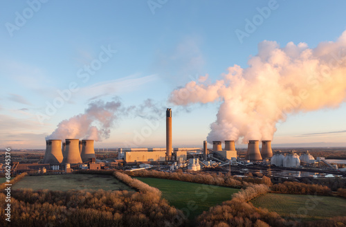 coal fired power station in UK with coal stack and biofuel storage tanks for clean energy production