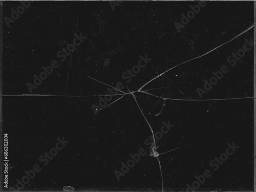 Texture of broken glass with scratches on black background for Y2K style work and creating crack effects for aged retro grunge style