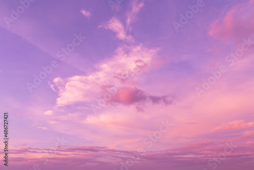 Epic dramatic pink purple violet blue beautiful sky. Beautiful soft gentle sunrise, sunset with cirrus clouds in sunlight background texture