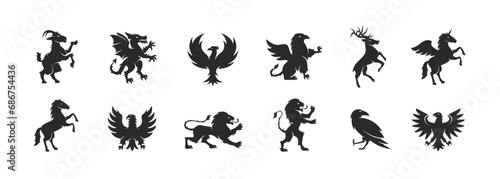 Heraldic animals set. Animals elements for Coat of Arms design. Heraldic symbols. Dragon, Goat, Phoenix, Lion, Eagle, Raven, Griffin, Horse silhouettes. Vector illustration. 