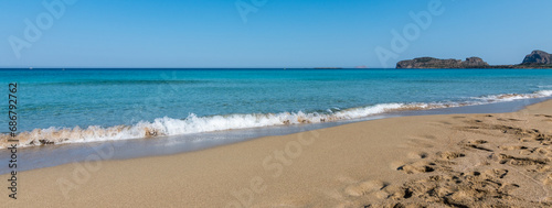 Banner View of the sea in the Island with sandy beach, cloudless and clear water. Tropical colours, peace and tranquillity. Turquoise sea. Falasarna beach, Crete island, Greece.