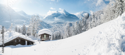 Germany, Bavaria, Berchtesgaden, Mountain hut and Watzmann in deep snow