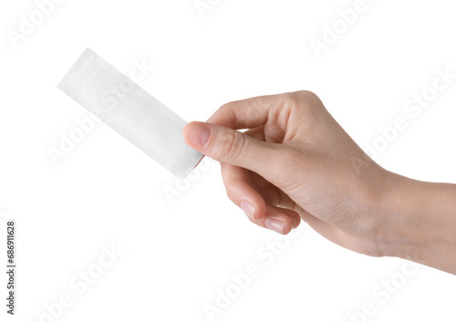 Woman holding medical adhesive bandage isolated on white, closeup