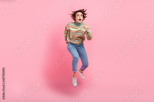 Full body size photo of running jump air nervous girl stressed scared her drunk husband dissatisfied isolated on pink color background