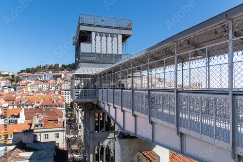 Lisbon, Portugal-October 2022; High level view of Santa Justa Lift, a cast-iron elevator with ornamental iron work details built in 1902 to connect lower streets with Carmo Square