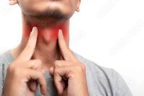 Inflammation of the thyroid gland, sore throat and cough, man with neck pain on white background, health problems concept. Pain points are highlighted in red. Close up. Isolated on white background.