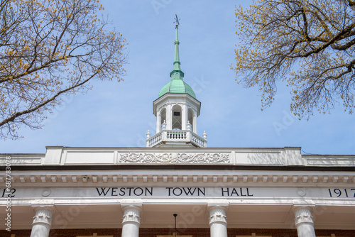 Weston Town Hall at Lanson Park in spring in historic town center of Weston, Massachusetts MA, USA. 