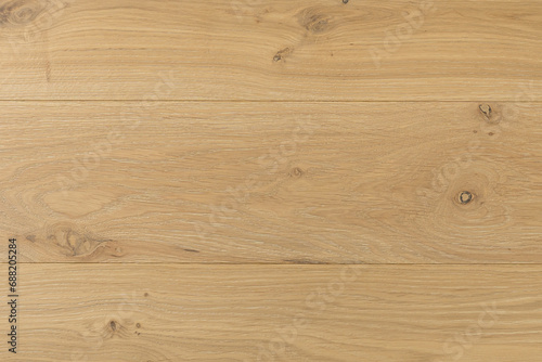 Texture of natural oak parquet close-up. Wooden boards for polished laminate. Hardwood sample background