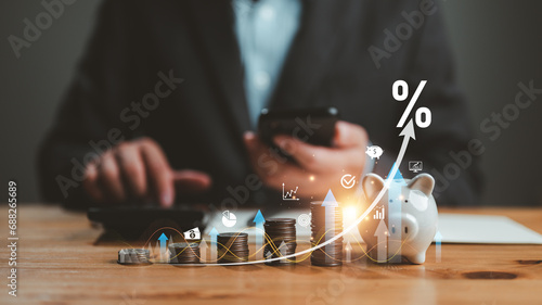 Interest rate and dividend concept, businessman calculating income and return on investment, save, income, return, retirement, compensation fund, investment, dividend tax, stock market, saving, trade.