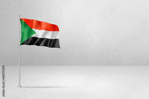 Sudan flag isolated on white concrete wall background