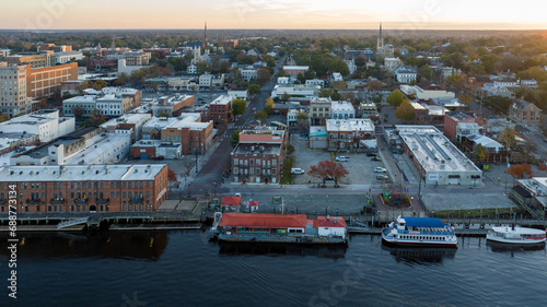 Aerial view of historic downtown Wilmington, NC. Riverwalk next to the Cape Fear River.