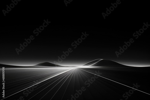 A black and white photo of a long road. Perfect for adding a sense of depth and mystery to any project