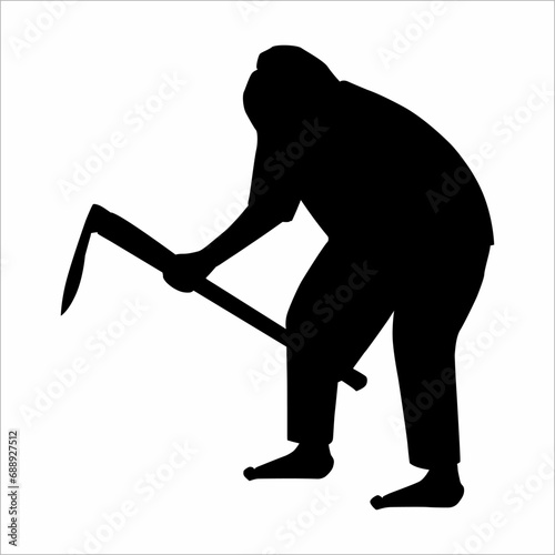 Silhouette of a person hoeing