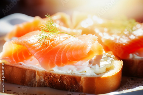 A delicious appetizer of fresh fish. Salmon or trout sandwich. Tender sandwich with fish bread and butter close-up.