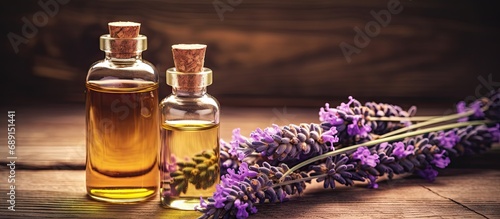 Natural organic oil used in cosmetology for moisturizing aromatherapy gentle body treatment handmade soap creating a relaxing and harmonious atmosphere with lavender flowers on a wooden backgro
