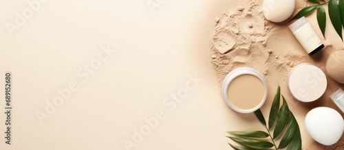 Eco friendly bathroom accessories and cosmetic products on a beige background with leaf shadows Copy space image Place for adding text or design