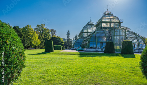 Large greenhouse in garden.