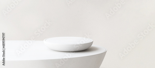 Modern round white plate shape podium on table counter in sunlight for luxury organic cosmetic, skincare, beauty, body, hair care, treatment, fashion product display background 3D