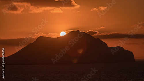 Sunset on Amorgos island aerial timelapse from above. Greece