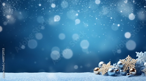 a snowflake and ornaments on a snowy surface
