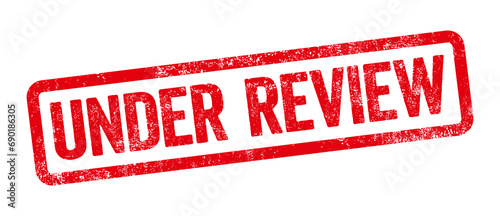 Red stamp on a white background - Under review
