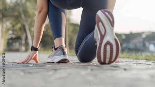 Close-up photo of women is sports shoes Get ready for a run on a bright spring day.