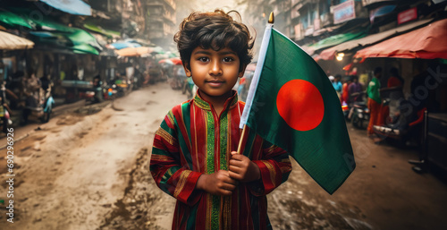 Bangladeshi boy holding Bangladesh flag in Dacca street