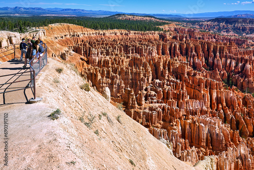 Tourists looking at the panorama at the Inspiration Point Lookout in the Bryce Canyon National Park. Utah USA