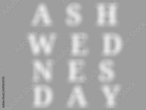 Design blurred Ashes Day text on a gray background