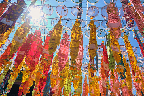 buddhist flags in a temple in Lamphun, thailand