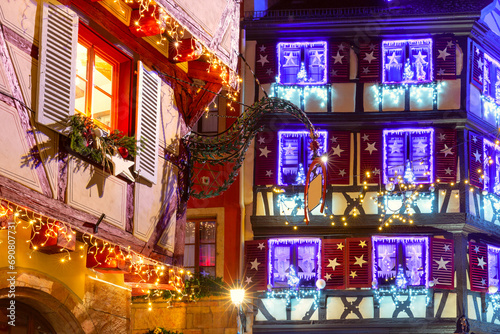 Decorated and illuminated half-timbered house in Old Town at Christmas night, Colmar, Alsace, France