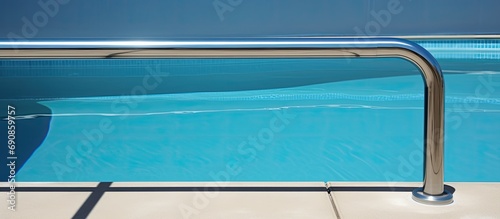 Public pool handrail, depicted horizontally.
