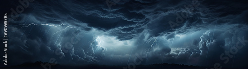 dark mysterious looking clouds in the beautiful rainy night sky over a forest, banner background