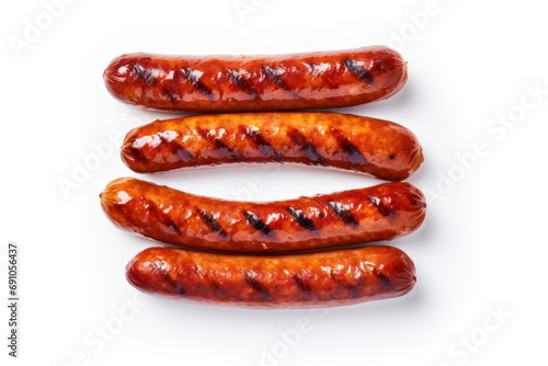Grilled sausage isolated on white background. Top view. Flat lay.