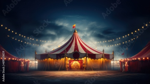 red and yellow circus tent at night with lights