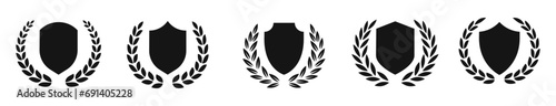 Shield with wreath silhouettes. Protection symbols. Shield vector icons. Laurel wreath and shields.