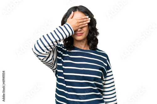 Young Argentinian woman over isolated background covering eyes by hands. Do not want to see something