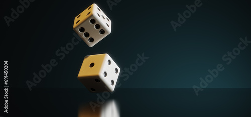 A pair of thrown dices on the reflective surface against dark background