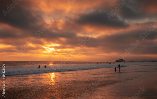Sunset at Santa Monica beach in Los Angeles, California.