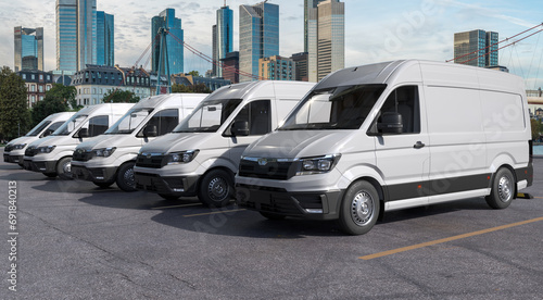 row of generic cargo vans in the parking lot