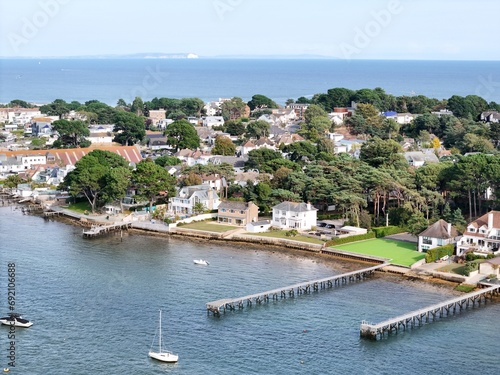 .Large waterfronted houses Poole harbour and Sandbanks Dorset UK affluent neighbourhood of Poole, aerial