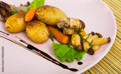 Baked mushrooms with garlic and potatoes, served with caramelized shalot and balsamic..