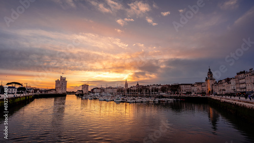 beautiful illuminated cityscape of the old harbor of La Rochelle